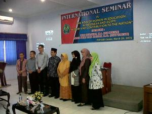 Ahmed Fikry Said Hassan, S.Ak dan Iwan Setiawan, M.A.